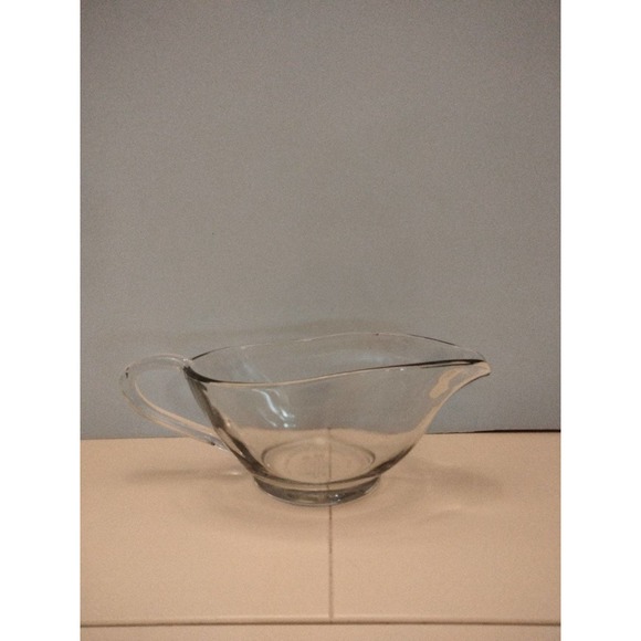 Anchor Hocking clear9"x 3.25" gravy bowl.